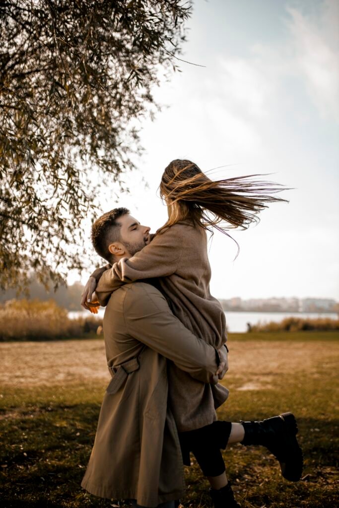medium-shot-couple-hugging-outdoors